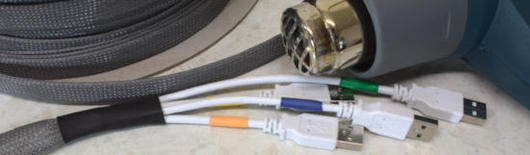 Cable loom using heat shrink and braiding