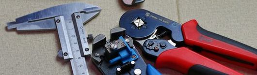 A mix of tools related to cable manufacturing